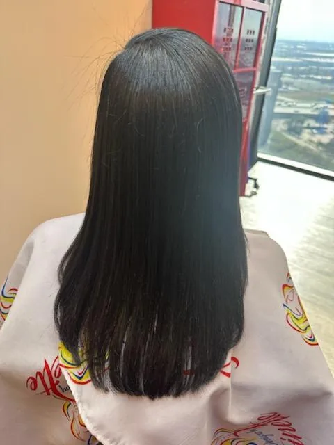 Rear view of smooth long straight hair