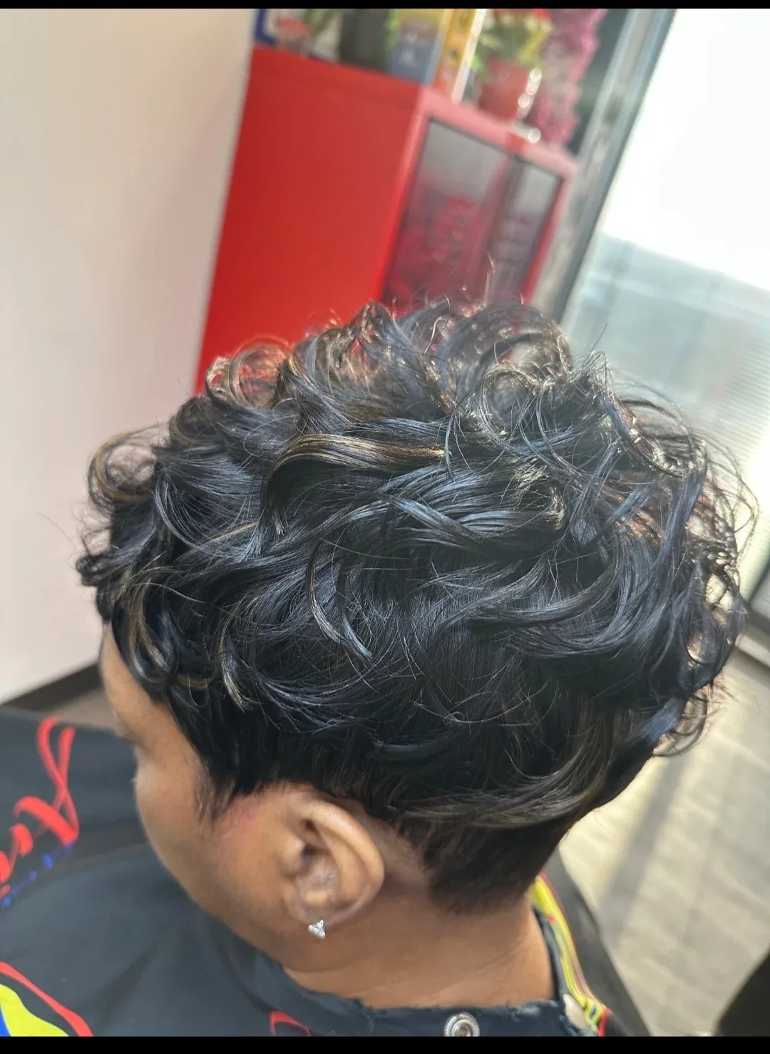 Short sculpted curls viewed from the side